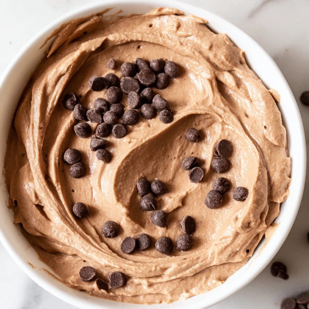 Sweet and rich, this gluten-free brownie batter dip served with various dipper options.