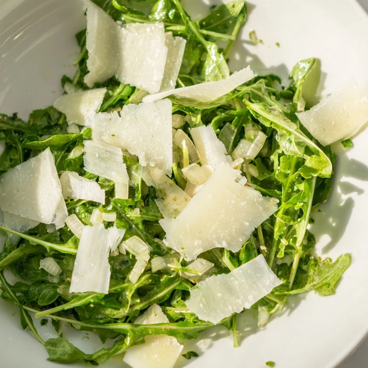Arugula Salad with Lemon Dressing: A fresh, vibrant salad with peppery arugula and bright lemon dressing.