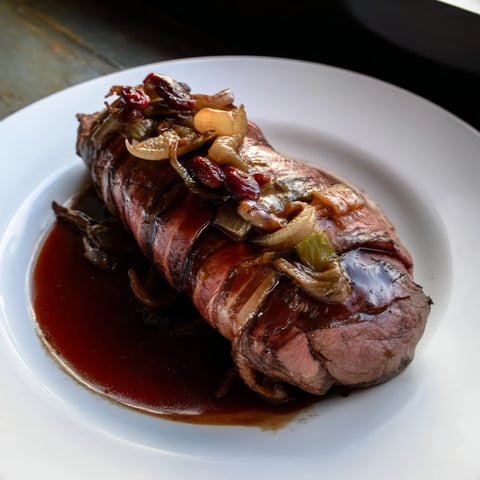 Tender Braised Beef Roulades, beautifully browned and served with rich goji berry gravy.