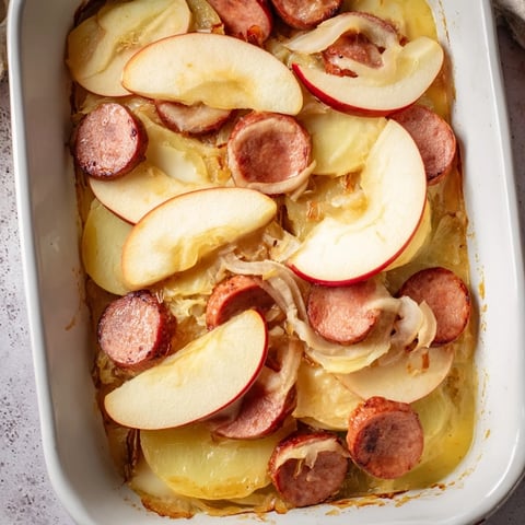 Golden baked Sauerkraut Casserole with maple-glazed apples, a German-American comfort food classic.