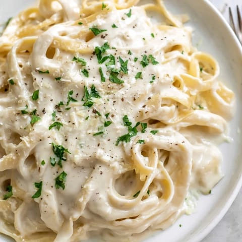 Quick Pasta Alfredo Cottage Hack, made with creamy blended cottage cheese and Parmesan, ready in minutes.
