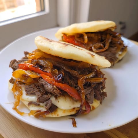 Fragrant Lebanese Mjadra: a close-up shows the fluffy rice and lentils, ready to serve with onions.