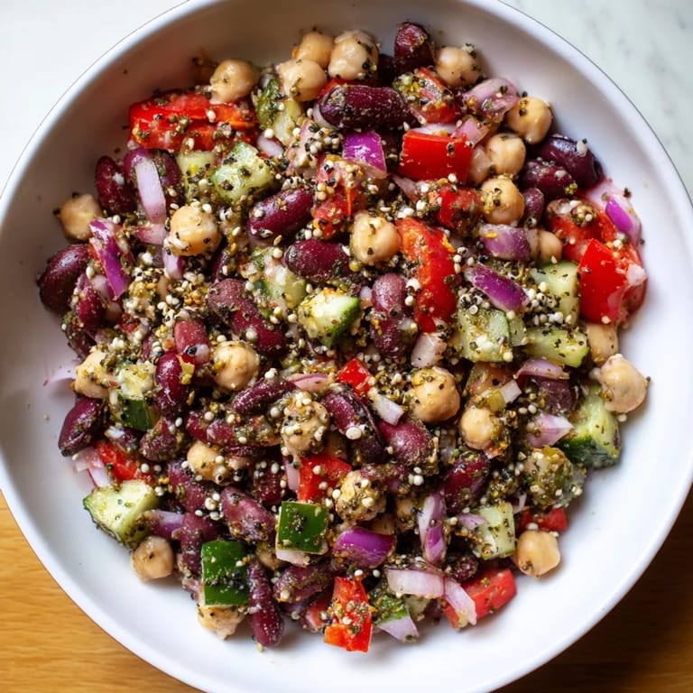Fresh, vibrant image of a Dense Bean Salad with Wellness Seeds, bursting with colorful vegetables.